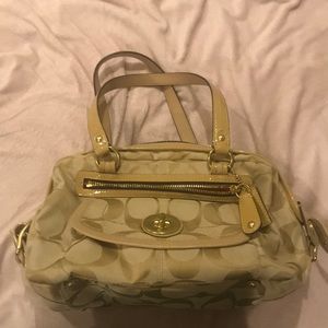Large tan/cream Coach purse.
